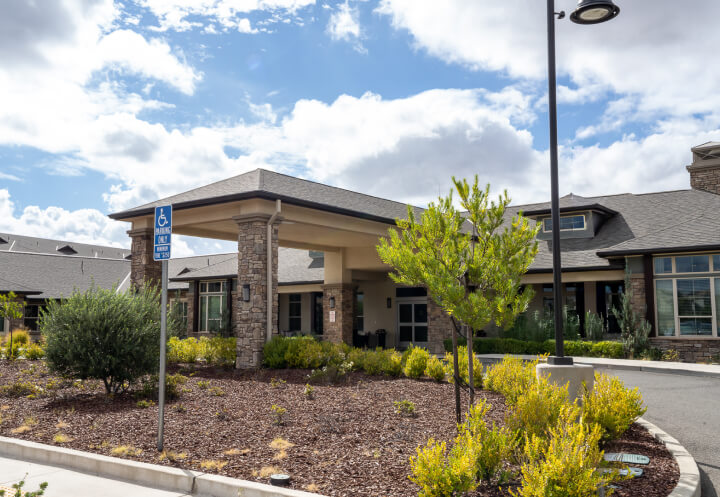 Private Dining Room With Navy Blue Chairs Assisted Living Facility entrance-drive-way-assisted-living